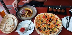 Vegan pizza, mayo & falafel. (Meat dish is steak and pumpkin puree) at Kavarna Klubu Cross in Prague