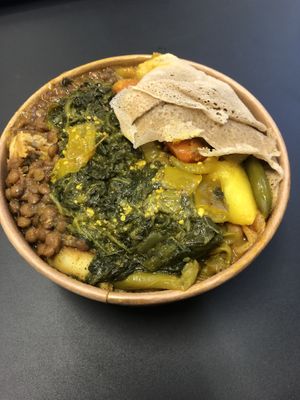 Five curries with injera and chilli relish  at Red Tent Ethiopia in South East London