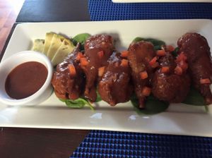 vegan chick'n wings with spicy BBQ sauce  at Equelecua Cuban Cafe - Cloud Kitchen in Los Angeles