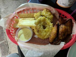 tostones, plantains and yucca with garlic sauce at Equelecua Cuban Cafe - Cloud Kitchen in Los Angeles