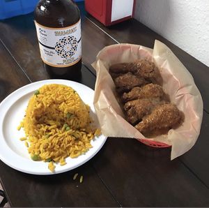 Mustard wings and yellow rice!  at Equelecua Cuban Cafe - Cloud Kitchen in Los Angeles