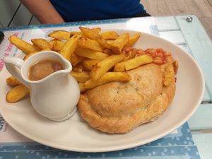 Pasty, chips, beans and gravy. Very authentic pasty style! at Blondes in Cottingham