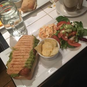 Vegan 'fish finger' & mushy pea panini with salad  at Blondes in Cottingham