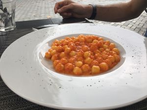 Gnocchi to die for - red pepper sauce  at Felice Ristorante Pizzeria in Lucca