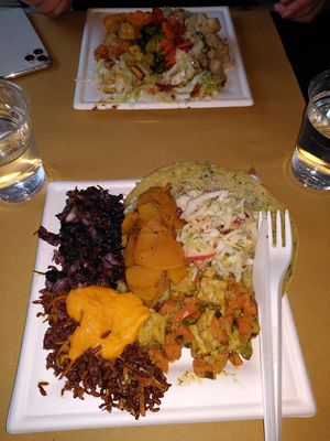 Radish, rice, tempeh, carrot and ginger sauce, pumpkin, salad and a chickpea pancake! at Mangia la Foglia Bio  in Parma