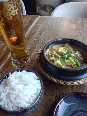 Cari and Tiger beer at Soy in Berlin