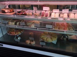 Cheese display case; delicious cheeses and desserts at Fru Fru Terra in Portland