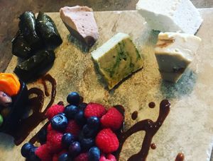 6 types of cheese with fruit, a delicious butter, bread and this grape leaf thing that I loved at Fru Fru Terra in Portland