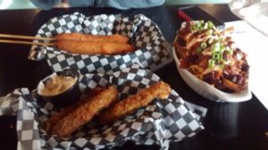 Corn dogs, deep fried pickles, chili fries. at The Buckingham in Edmonton
