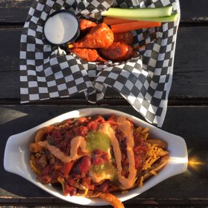 chilli cheese fries and chick'n wings at The Buckingham in Edmonton