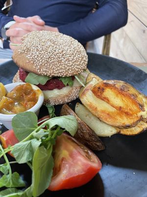 Hippy love burger with potato wedges   at BodhiGreen Vegetariano in Alicante