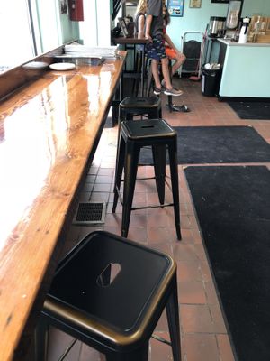 Stool seating area inside, 8 total. at The Holy Donut - Park Ave in Portland