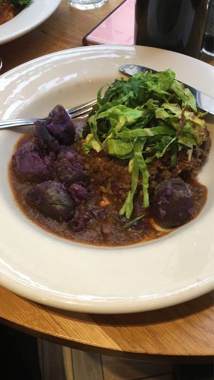 Vegan Haggis with purple potatoes and red wine gravy at Henderson's Vegan in Edinburgh