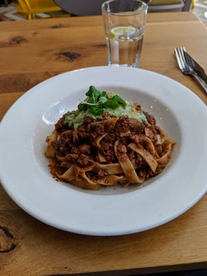 Lentil pasta with walnuts, aubergine, and basil cream. at Henderson's Vegan in Edinburgh