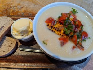 Buffalo cauliflower soup with roasted corn and salsa, served with bread or oatcakes at Henderson's Vegan in Edinburgh