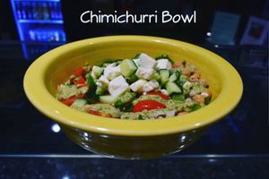 Spinach, basmati rice , garbanzo beans, peppers, grape tomatoes, cucumbers, feta cheese, and homemade chimichurri sauce at Live Juice in Concord