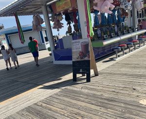 Boardwalk sign, Aloha can be found to the far left.  at Aloha Smoothie Company in Wildwood