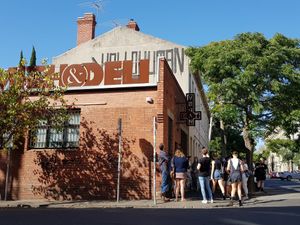Customers waiting outside for their order at Smith & Deli in Collingwood