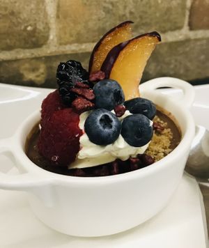 Panna cotta chiocolato al frutta fresca  at Lord Bio in Macerata