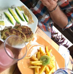 fresh fruits and veggie burgers  at El Vegano Andante in Medellin