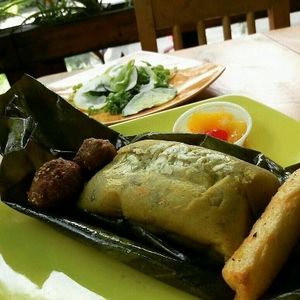Tamal imitación pollo desmechado  at El Vegano Andante in Medellin