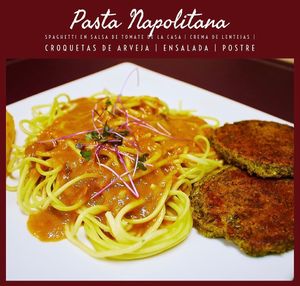 Spaghetti with tomato sauce, lentil soup, vetch protein, salad and dessert  at El Vegano Andante in Medellin