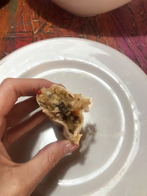 The empanada was served hot and steamy.  at Pacha Manka in Humahuaca