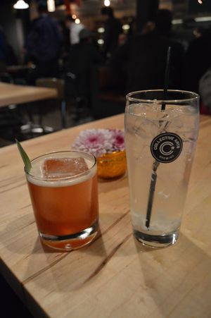 Wagtails & Pipits cocktail (left) and roasted coconut water (right). Yum! at Sabai Sabai in Toronto