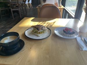 Breakfast scramble, oatmilk latte, and fruit tartts at Passion Flour Patisserie in Salt Lake City