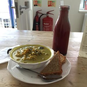 vegan stew with spelt bread and juice at So Pure in London