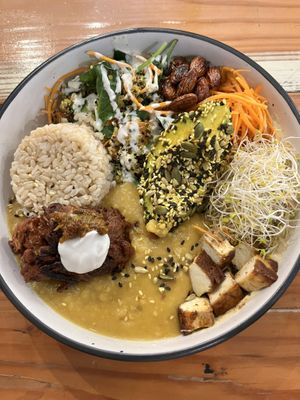 Wholefood bowl with dhal & onion bhaji   at Veggie Vie in Adelaide