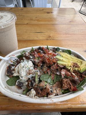 Breakfast burrito on greens  at Thrive Juice Bar and Kitchen in Bar Harbor