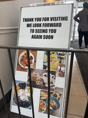 Sign when you exit the restaurant   at Wei's Noodle House in Ottawa