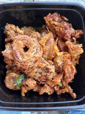 Some kind of onion fritters - very tasty..  at Walee - EM Quartier in Bangkok