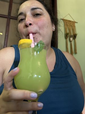 Hot babe drinking homemade lemonade  at Kiwi Vegan Cafe in Tbilisi