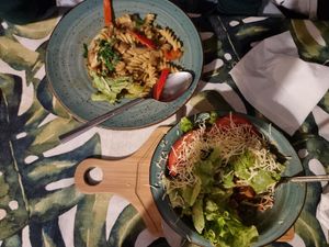 Ceaser salad, pasta with mushroom sauce at Kiwi Vegan Cafe in Tbilisi