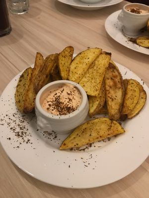 Potato wedges & Aioli dip. Delish !!  at Kiwi Vegan Cafe in Tbilisi