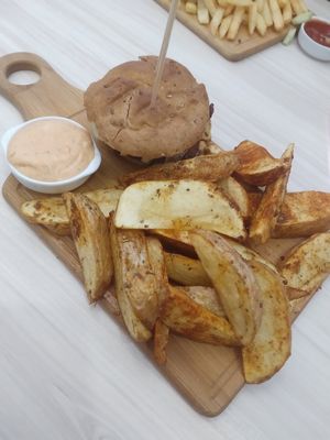 Cheese falafel burger with wedges and special sauce - 8 GEL at Kiwi Vegan Cafe in Tbilisi