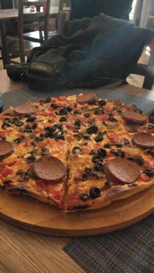 Big vegan pizza, was good but didn't taste like a classic pizza to me.  at Kiwi Vegan Cafe in Tbilisi