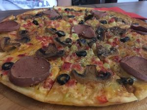 Delicious pizza at Kiwi Vegan Cafe in Tbilisi