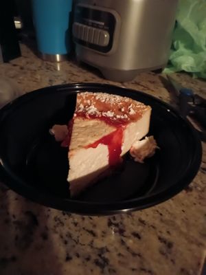 Our vegan cheesecake stuck to the lid of the container a bit, but it was still delicious! at Triangle Tavern in Philadelphia