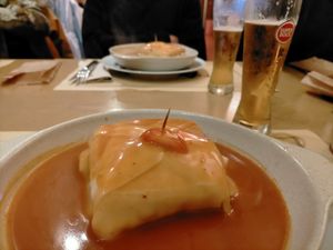 Francesinha de tofu, chouriço fumado e cogumelos frescos at Francesinhas Al Forno da Baixa in Porto