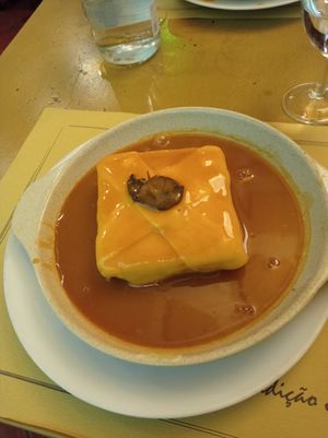 Francesinha de tofu at Francesinhas Al Forno da Baixa in Porto