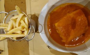 Curry francesinha at Francesinhas Al Forno da Baixa in Porto