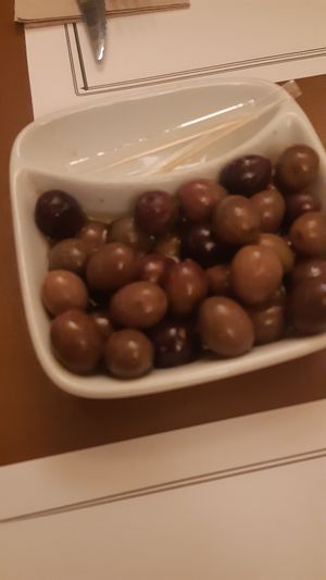 Side of olives at Francesinhas Al Forno da Baixa in Porto