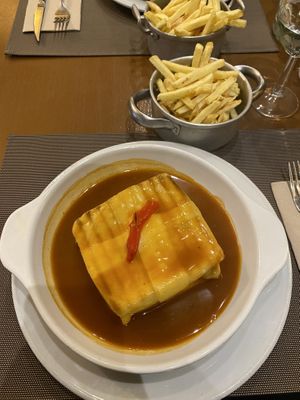 seitan francesinha with fries   at Francesinhas Al Forno da Baixa in Porto