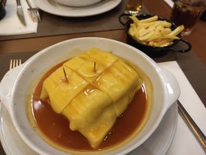 Francesinha de seitan at Francesinhas Al Forno da Baixa in Porto