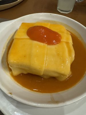 Tempeh with vegan cheese  at Francesinhas Al Forno da Baixa in Porto