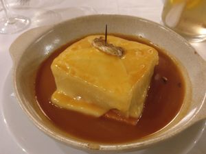 Francesinha tofu with mushrooms and tomatoes at Francesinhas Al Forno da Baixa in Porto