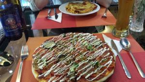 Vegan pizza and lasagna at Bosco Verde Italian Vegan Restaurant in Ulaanbaatar